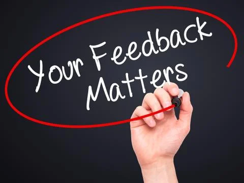Man Hand writing Your Feedback Matters with black marker on visual screen Foto stock