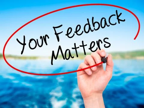 Man Hand writing Your Feedback Matters with black marker on visual screen Stock Photos