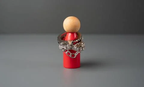 A man handcuffed to himself. The concept of complexes and stiffness. Shynes.. Stock Photos