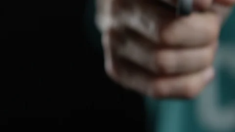 Man with handgun Stock Footage 113828585