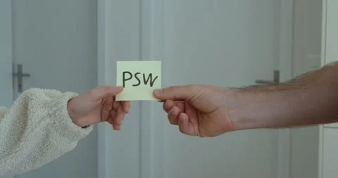 Man Handing Over Password on Paper – Cybersecurity Risk Concept Stock Footage 335228088