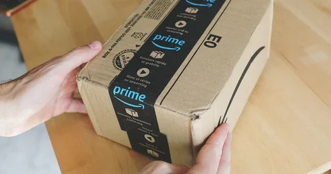 Man Handling An Amazon PRIME Package Stock Footage 94658872