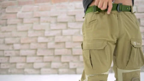 Man handling weapon Stock Footage 167088017