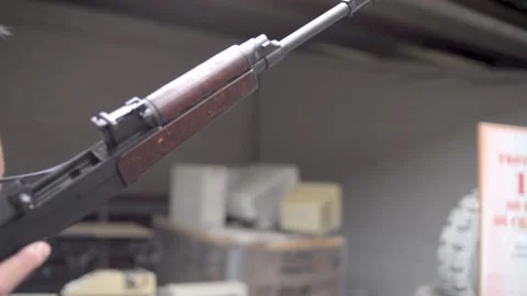 Man handling weapon Stock Footage 167088040