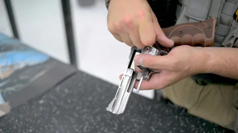 Man handling weapon Stock Footage 167088046