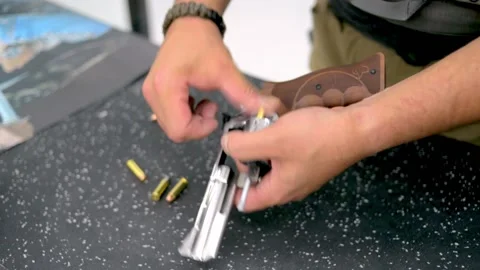 Man handling weapon Stock Footage 167088056