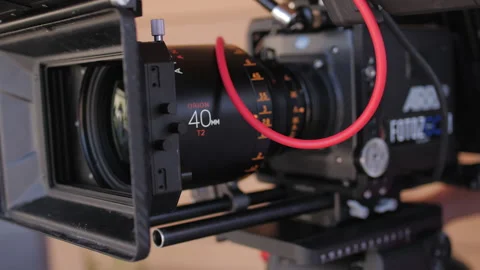 Man hands adjust video camera before shooting at set Stock Footage 231294177