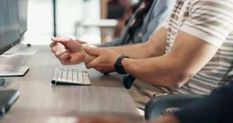 Man, hands and computer with wrist pain in office for overworked strain Stock Footage 340602598