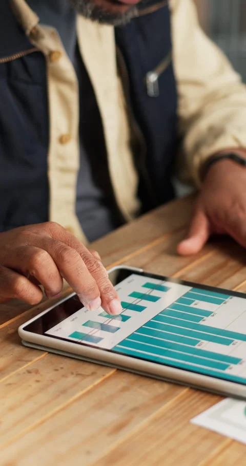 Man, hands and data in small business with tablet screen, check sales Stock Footage 347249869