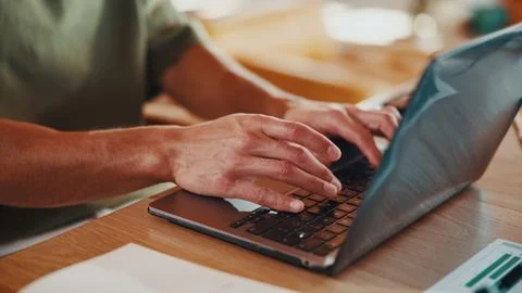 Man, hands and remote work in home with laptop, data analysis and typing re.. Stock Photos