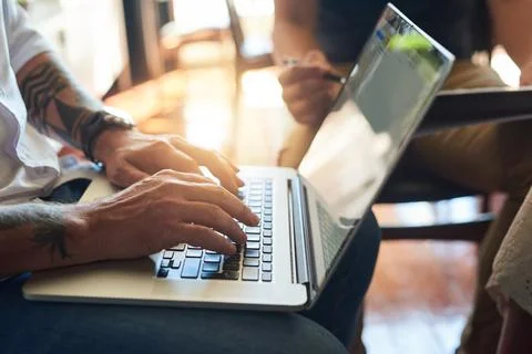 Man, hands and typing on creative laptop, web design and developer in startup Stock Photos