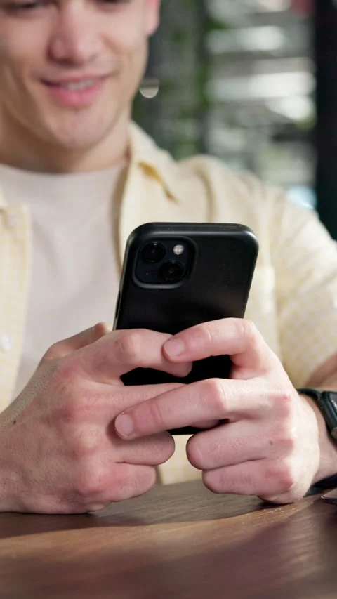 Man, hands and typing in office with phone, social media app and laugh for meme Stock Footage 343531492