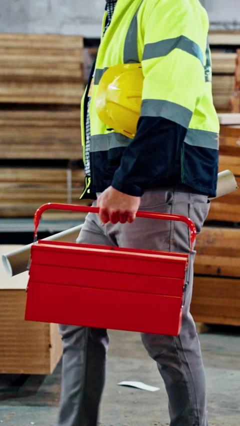 Man, hands and walk in workshop with toolbox, carpentry blueprint or woodwork Stock Footage 340448924