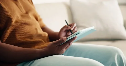 Man, hands and writing in home with tablet, remote work and graphic designer for Stock Footage 337755919
