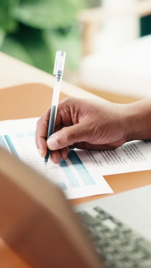 Man, hands and writing in office with document, accounting and signature for 库存影片 338050694