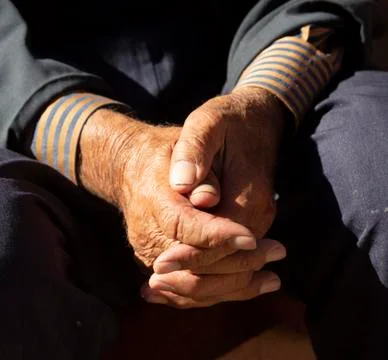 Man hands are folded in reflection Stock-Fotos