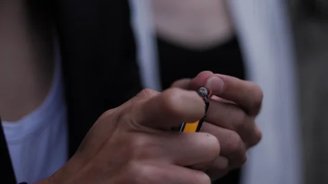 Man hands burn cigarette and grey ash falls down closeup Stock Footage 115245641