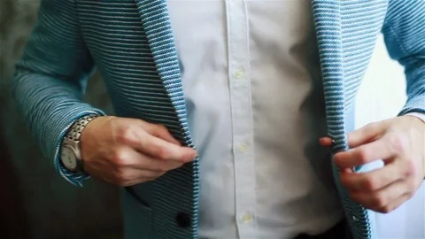 Man hands buttoning casual outfit jacket close up Stock Footage 71265837