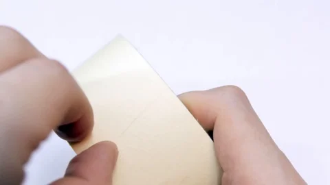 Man hands can not find the edge of a duct tape 動画素材 125222090