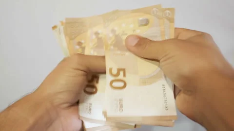 Man hands close up while counting Euro money bills,european economy value Video stock 139340263