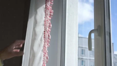 Man hands close white curtains on plastic window closeup Video stock 134998238