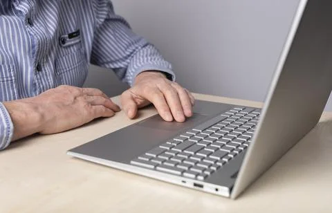 Man hands closeup on laptop. Using computer for work, online education Stock Photos