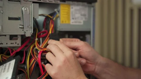 Man hands connect cables of computer system unit closeup Stock-Footage 197270466