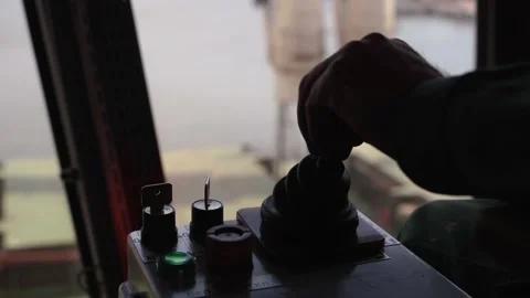 Man hands control joysticks at grain terminal operator cabin workplace. Worker Stock-Footage 201148693