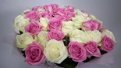 Man hands correct pink and white roses bouquet Stock Footage