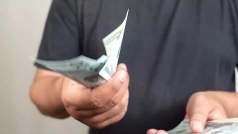 Man hands counting Dollar banknotes 動画素材 289387149