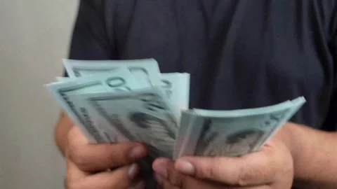 Man hands counting Dollar banknotes 動画素材 289387158