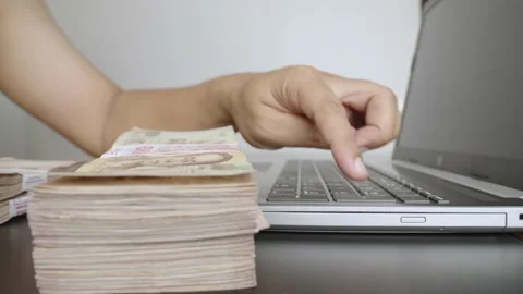 Man hands counting of thousands Thai baht banknotes money. Stock Footage 236014614