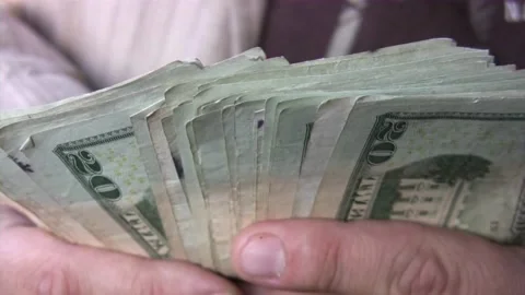 Man hands counts the money he earned. Concept of earnings, wealth, well-being, Stock-Footage 336260626