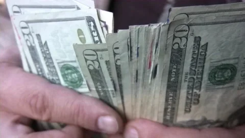 Man hands counts the money he earned. Concept of earnings, wealth, well-being, Stock-Footage 336260640