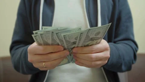 Man hands counts the money he earned. Concept of earnings, wealth, well-being, Stock-Footage 336260719