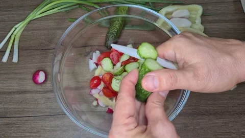 Man Hands Cut Fresh Vegetables For A Salad. Видео 165505208