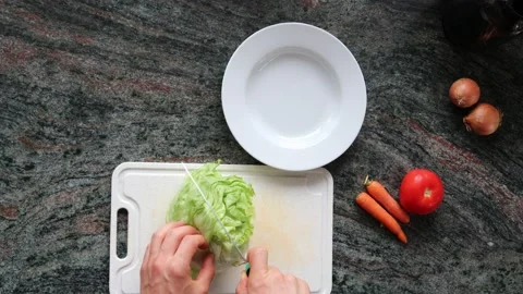 Man Hands Cutting Lettuce from Above, 4k Stock Footage 134315290