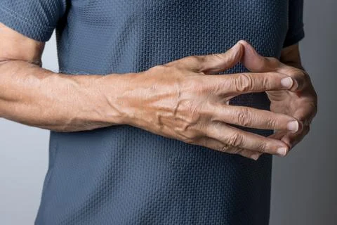 Man hands folded in front of him Foto stock