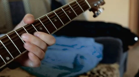 Man hands the guitar Stock Footage 62970841