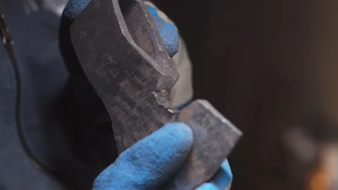 Man hands holding blank axe Stock Footage 129040120