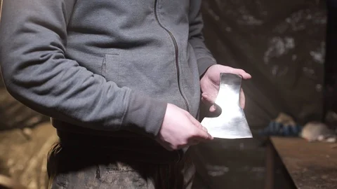 Man hands holding blank axe Stock Footage 129285365