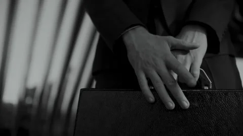 Man Hands Holding a Briefcase Video stock 259890893