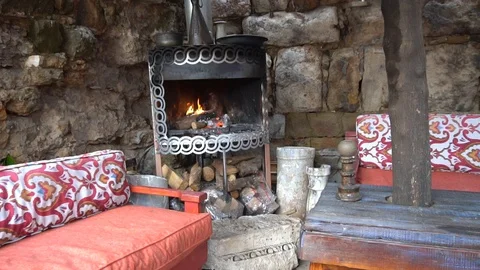 Man Hands Holding Coffee Or Tea Cup By Cozy Fireplace Stock Footage 105886406