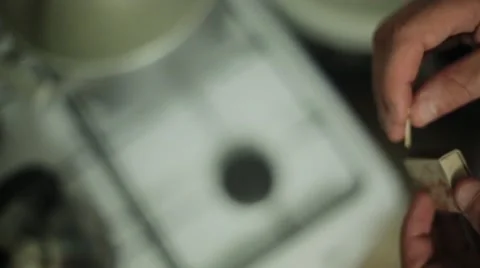 Man hands ignite match, hit on matchbox focus in. Fire. Close up Stock Footage 60374223