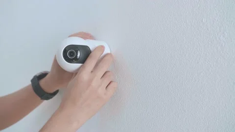 Man Hands Installing Cctv Camera On Wall For Security Video stock 166906515