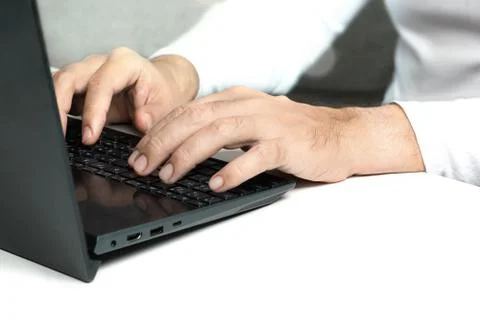 A man hands on keyboard Stock Photos