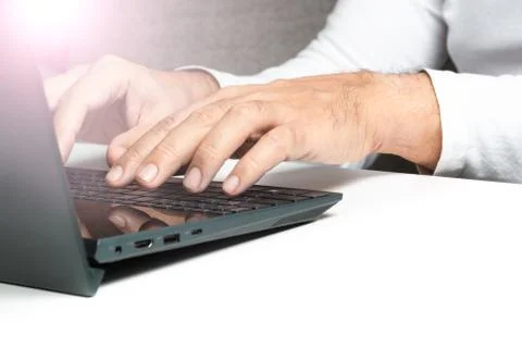 A man hands on keyboard Stock Photos