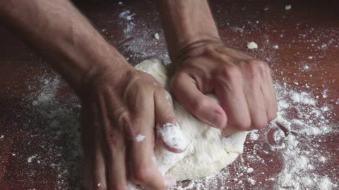 Man hands knead dough on table Stock Footage 249917085