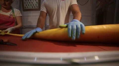 Man hands to make a big candy Stock Footage 59174006