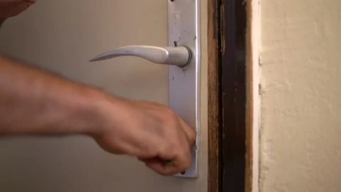 A man hands open the door Video stock 228938001